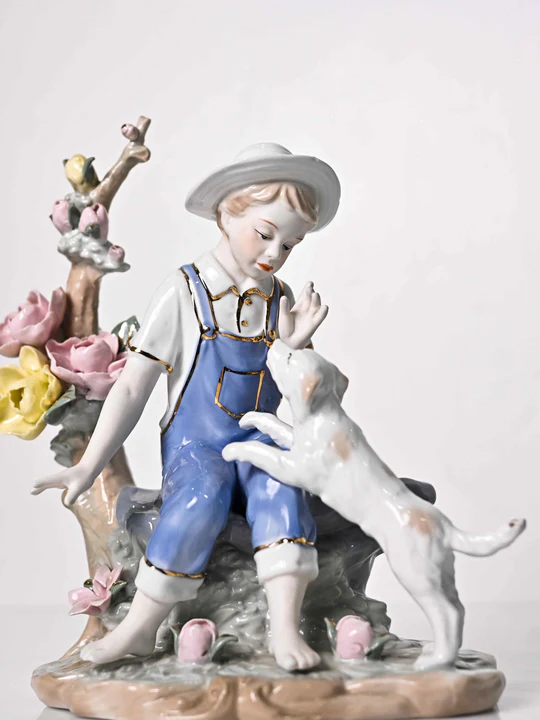 Image of Ceramic Showpiece – Boy and a Dog