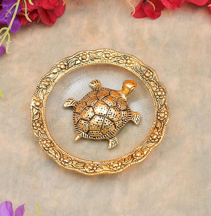 Image of Golden Metal Tortoise on Glass Plate – Symbol of Good Luck & Prosperity